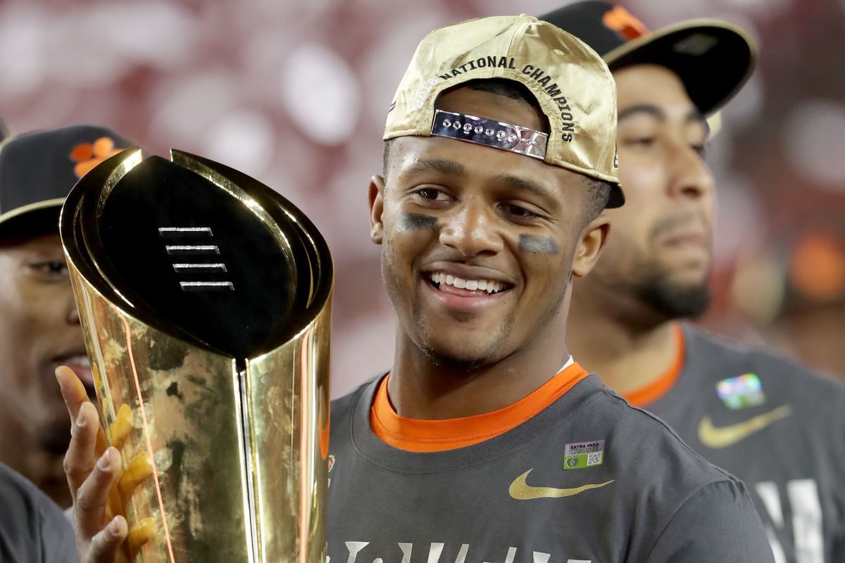 watson with championship trophy